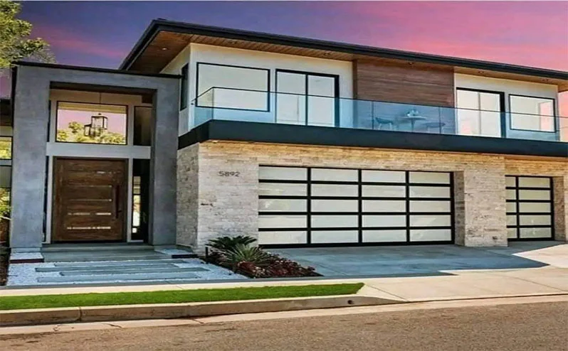 Sleek exterior design featuring modern stone and glass railing